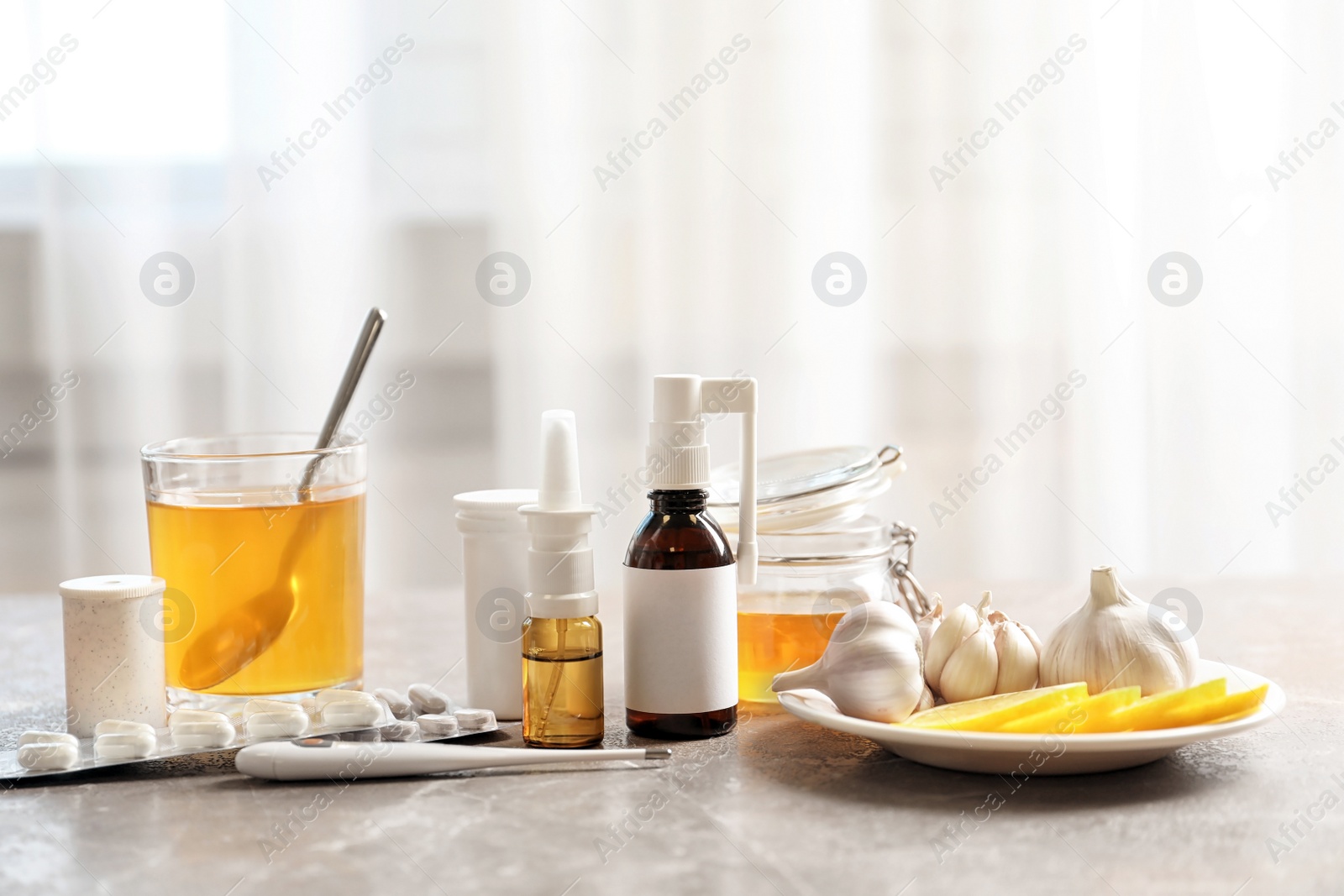 Photo of Natural and medical cold remedies on table