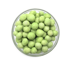 Tasty wasabi coated peanuts in glass bowl on white background, top view