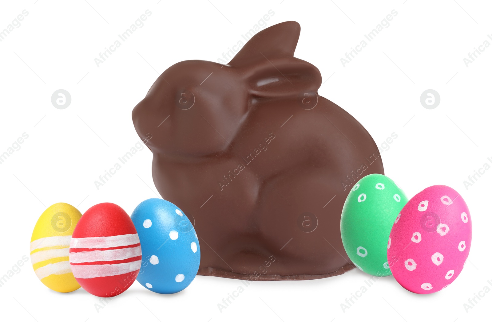 Image of Chocolate bunny and painted Easter eggs on white background