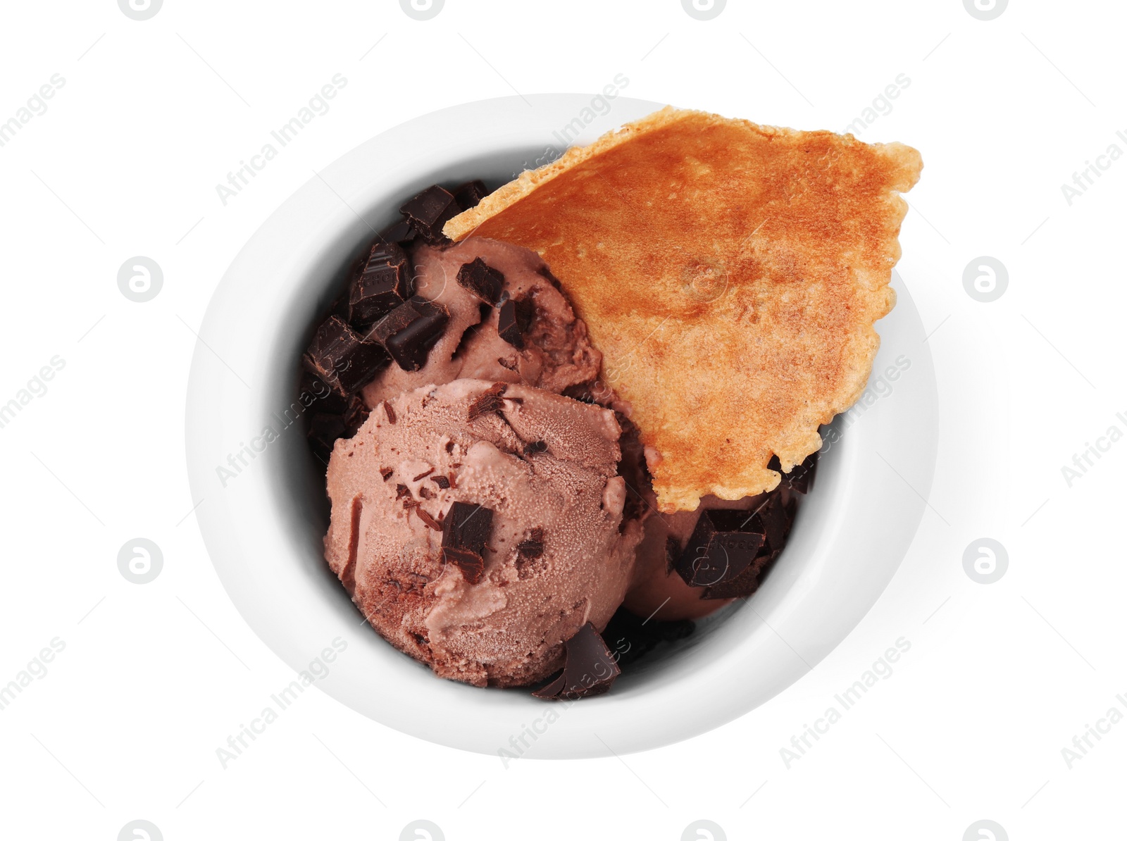 Photo of Tasty chocolate ice cream and piece of waffle cone in bowl isolated on white, top view