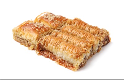 Photo of Eastern sweets. Pieces of tasty baklava isolated on white