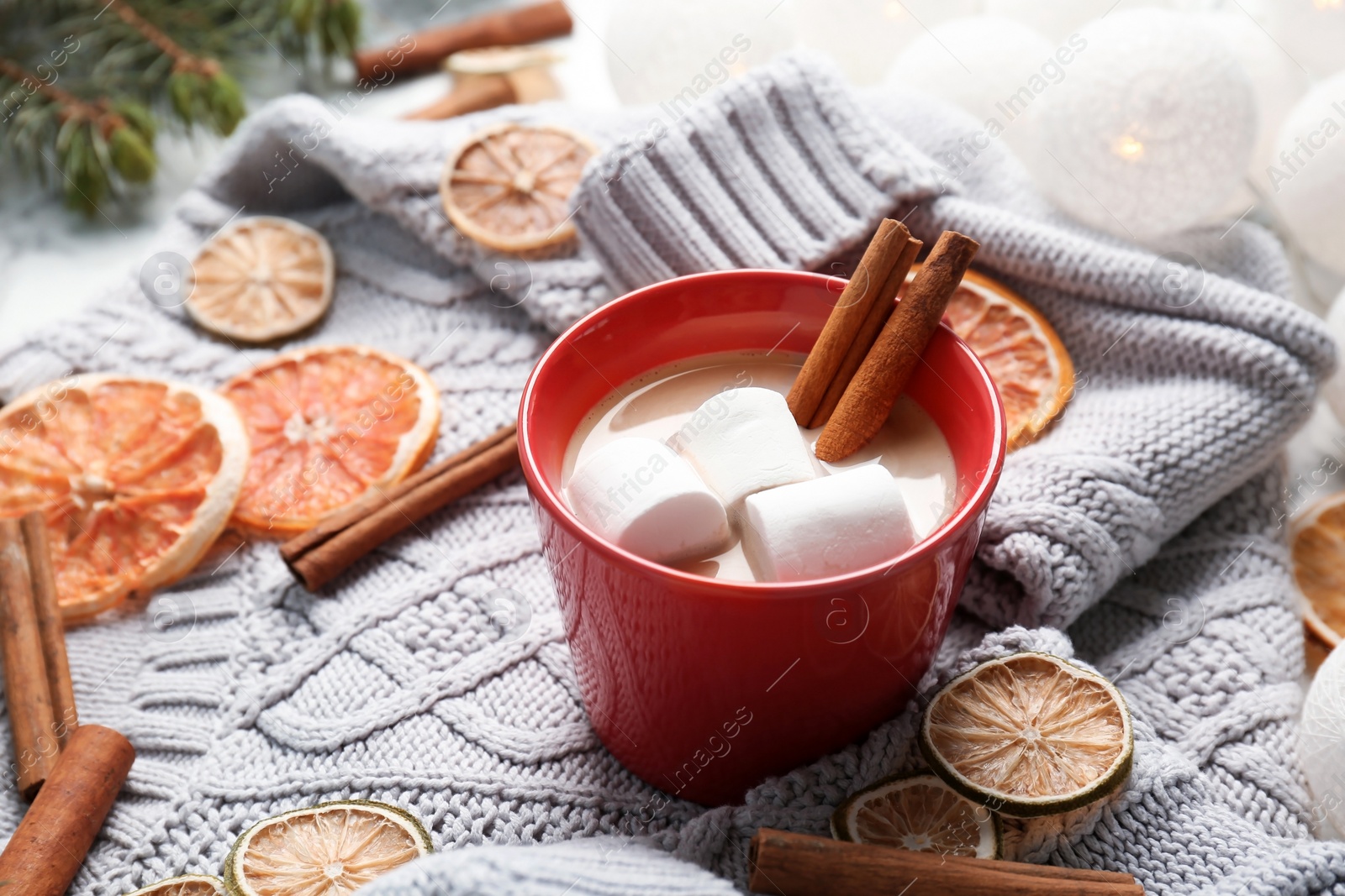 Photo of Composition with hot cocoa drink on table