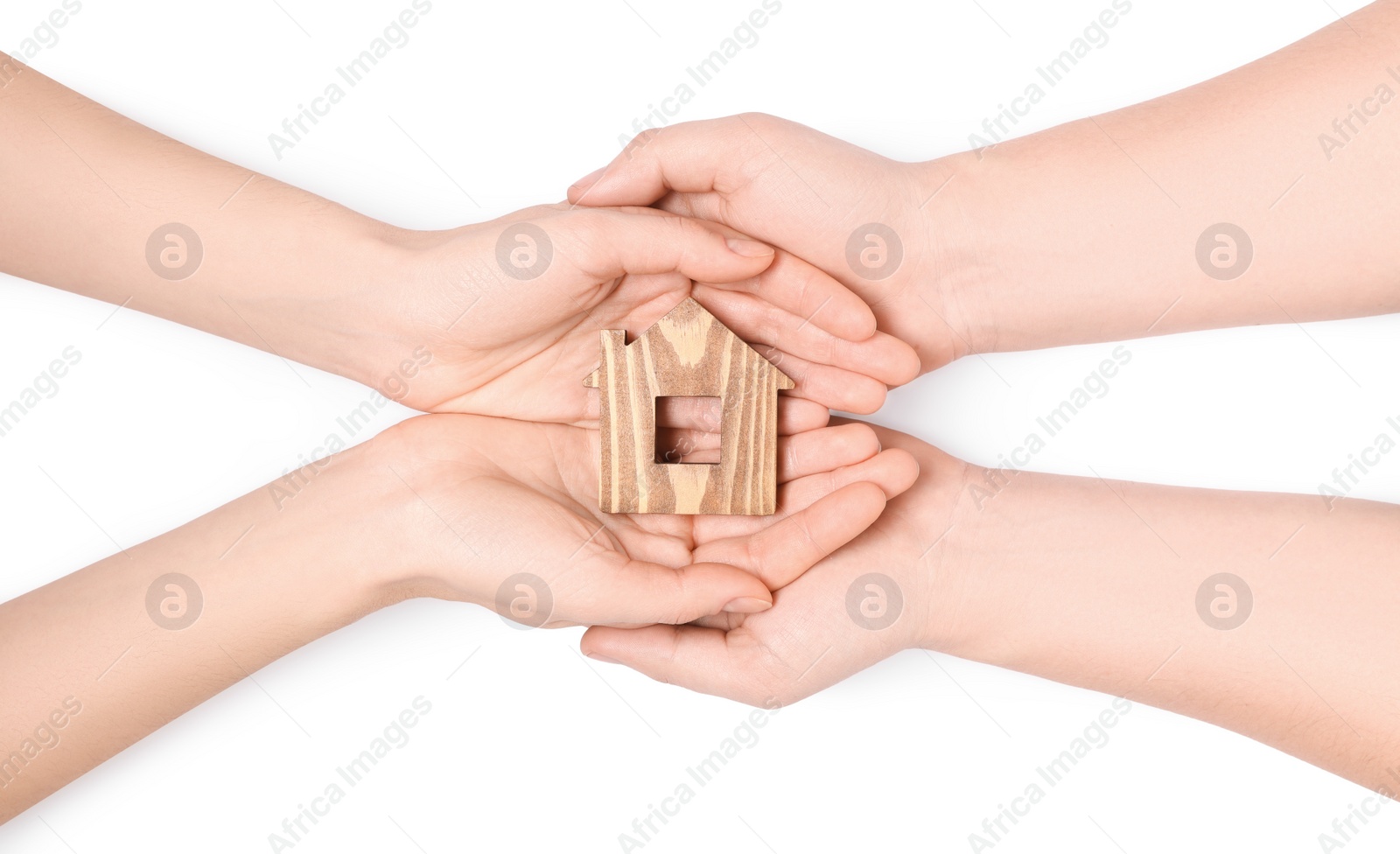 Photo of Home security concept. Couple holding house model on white background, top view