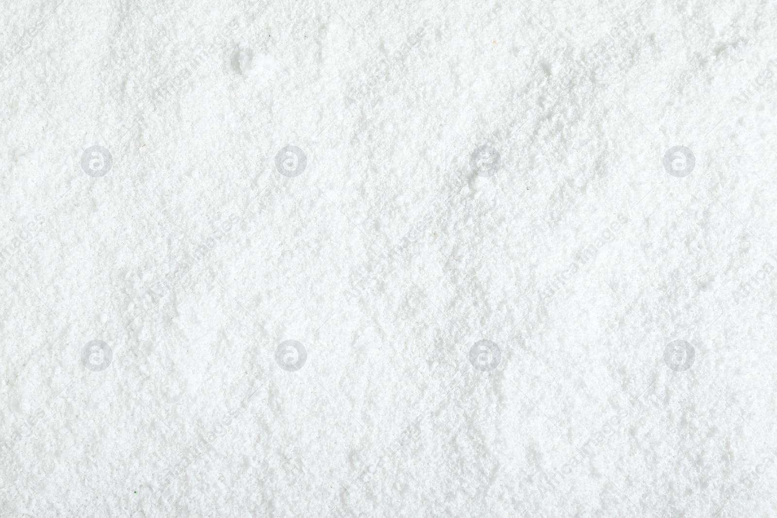 Photo of Pile of white snow as background, top view