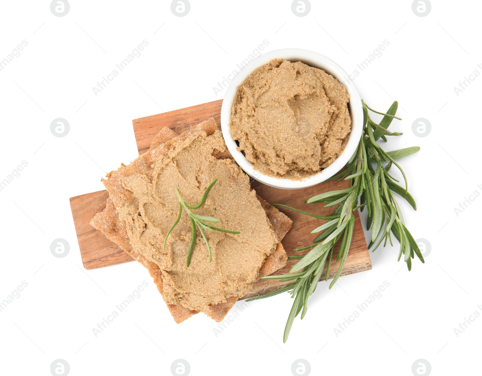 Photo of Crispy crackers with delicious meat pate and rosemary on white background, top view