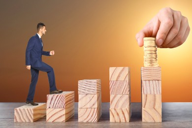 Image of Steps to success. Businessman climbing up stairs of wooden blocks to reach wealth. Man stacking coins on top, closeup