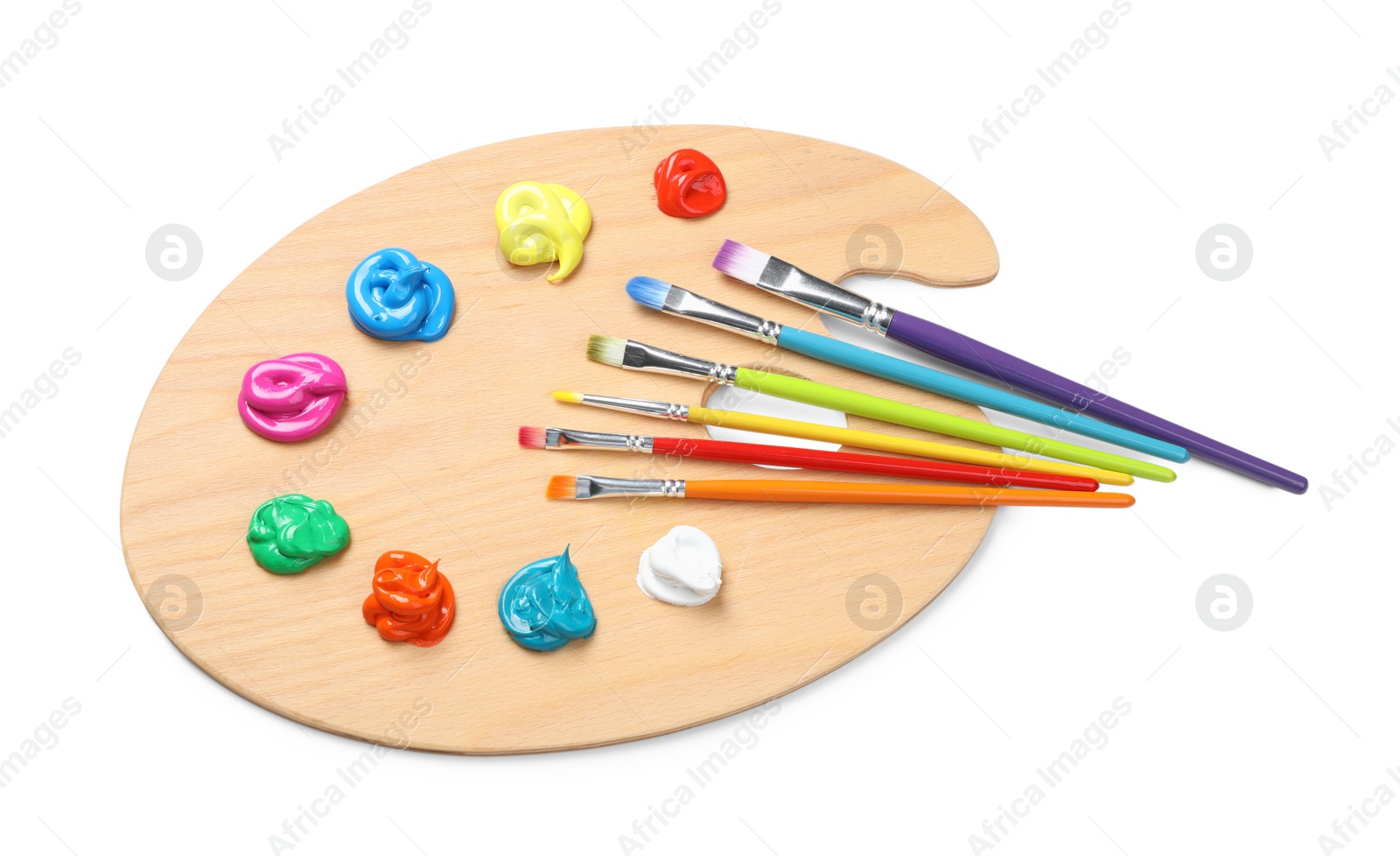 Photo of Palette with paints and brushes on white background, top view. Artist equipment