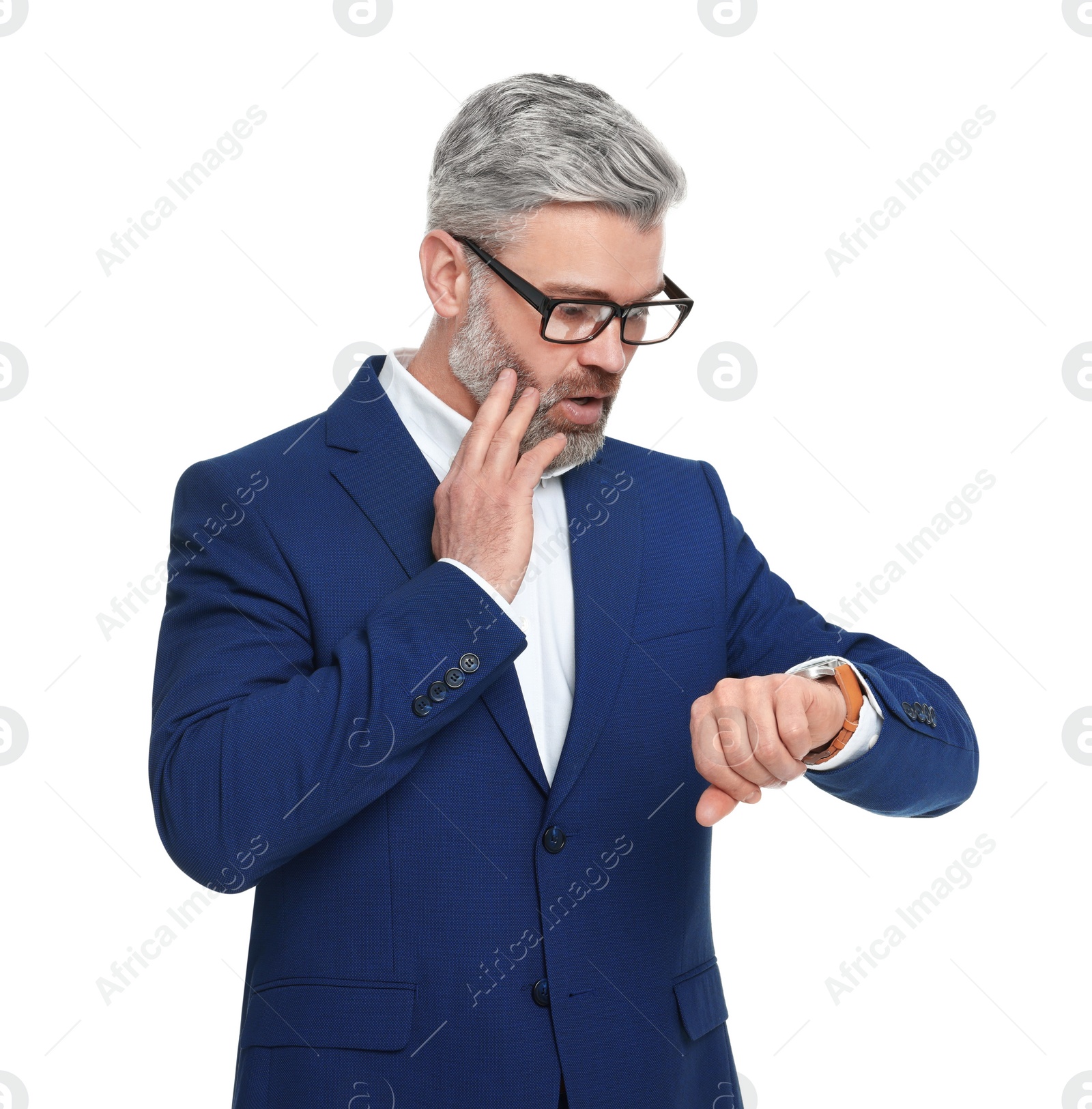 Photo of Mature businessman in stylish clothes checking time on white background