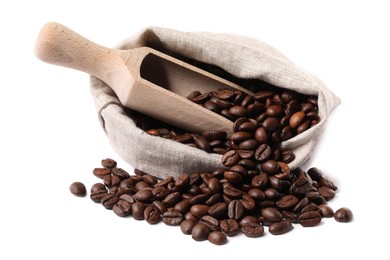 Photo of Bag and wooden scoop with roasted coffee beans isolated on white