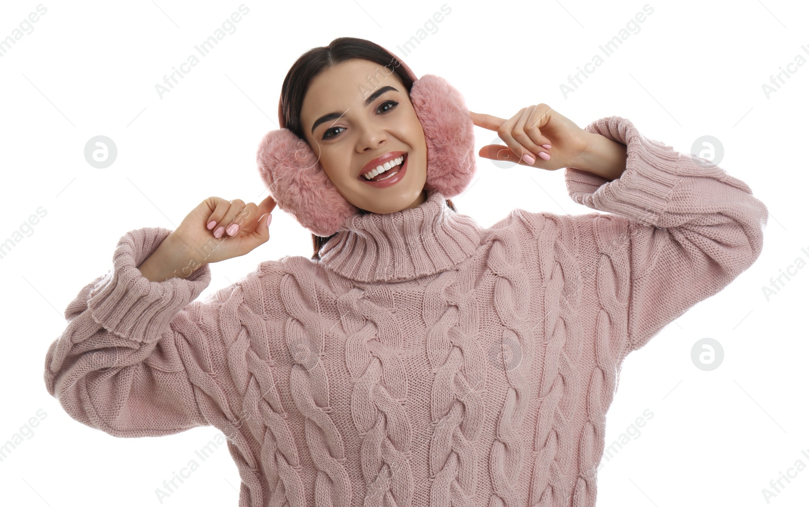 Photo of Beautiful young woman wearing earmuffs on white background