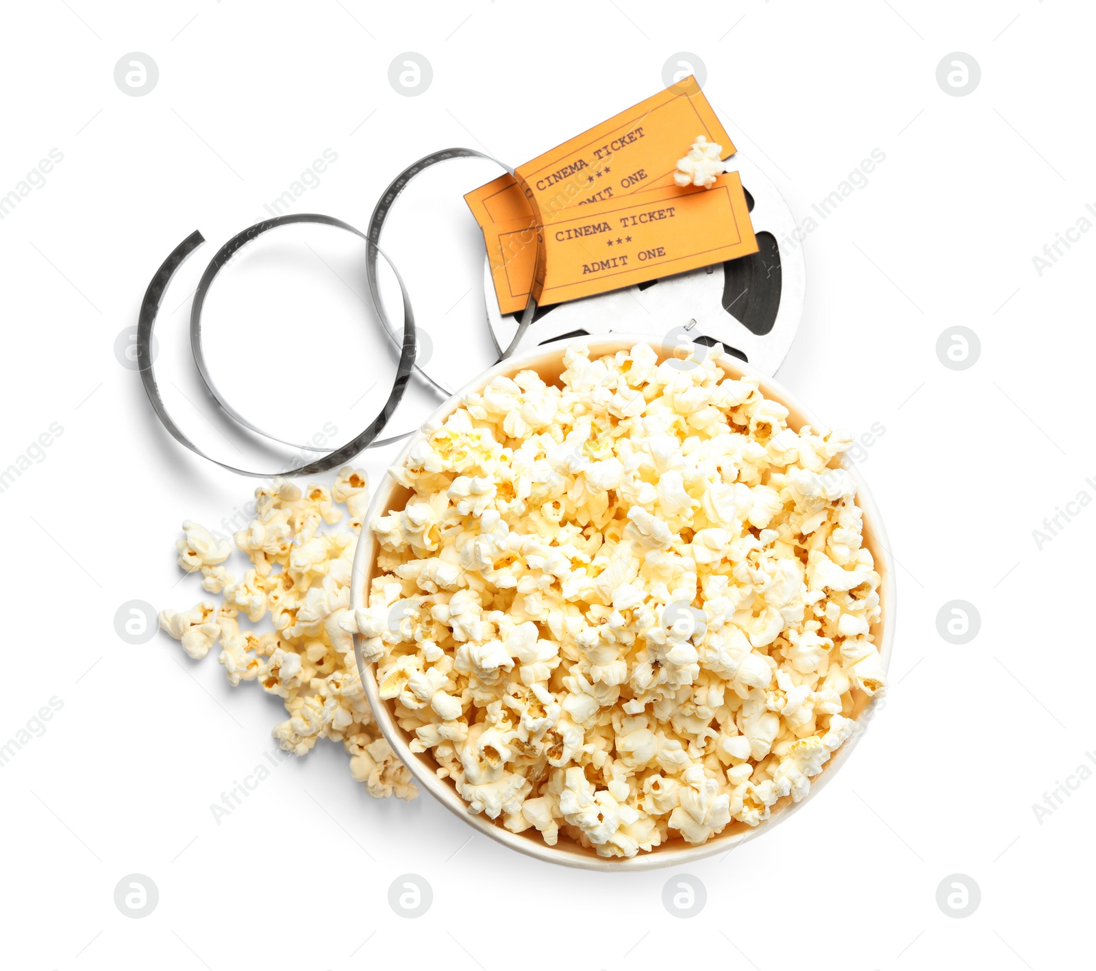 Photo of Popcorn, tickets and movie reel on white background, top view. Cinema snack