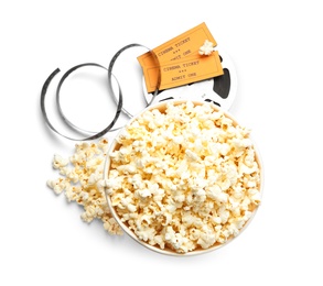 Popcorn, tickets and movie reel on white background, top view. Cinema snack