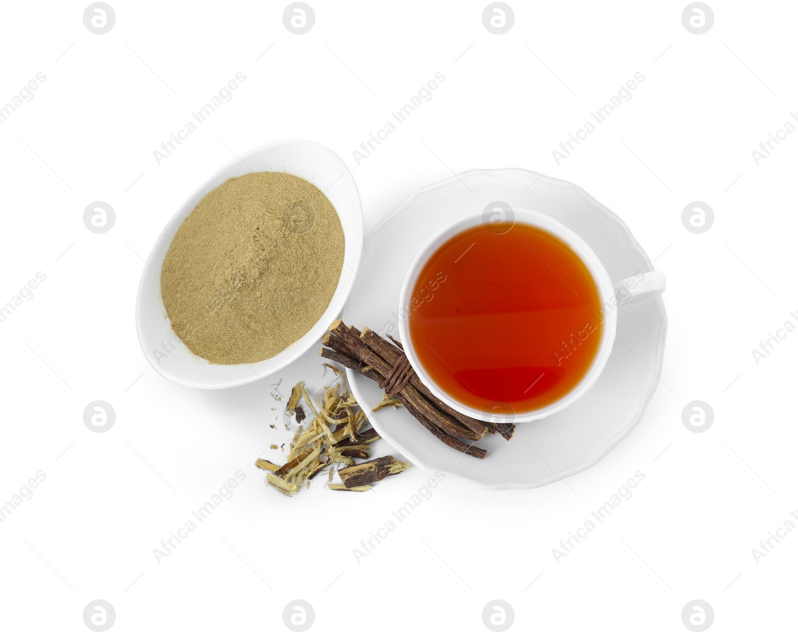 Photo of Aromatic licorice tea in cup, dried sticks of licorice root and powder on white background, top view