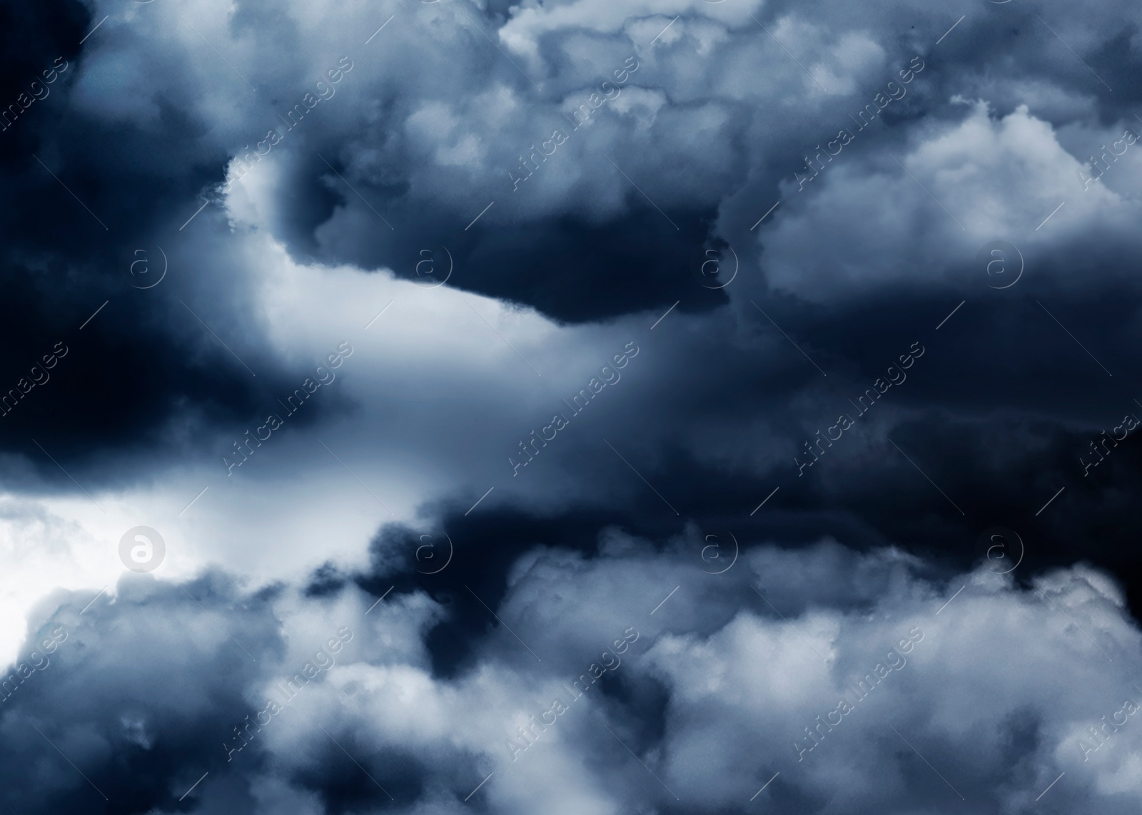 Image of Beautiful view of sky covered with grey thunderclouds