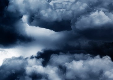 Image of Beautiful view of sky covered with grey thunderclouds
