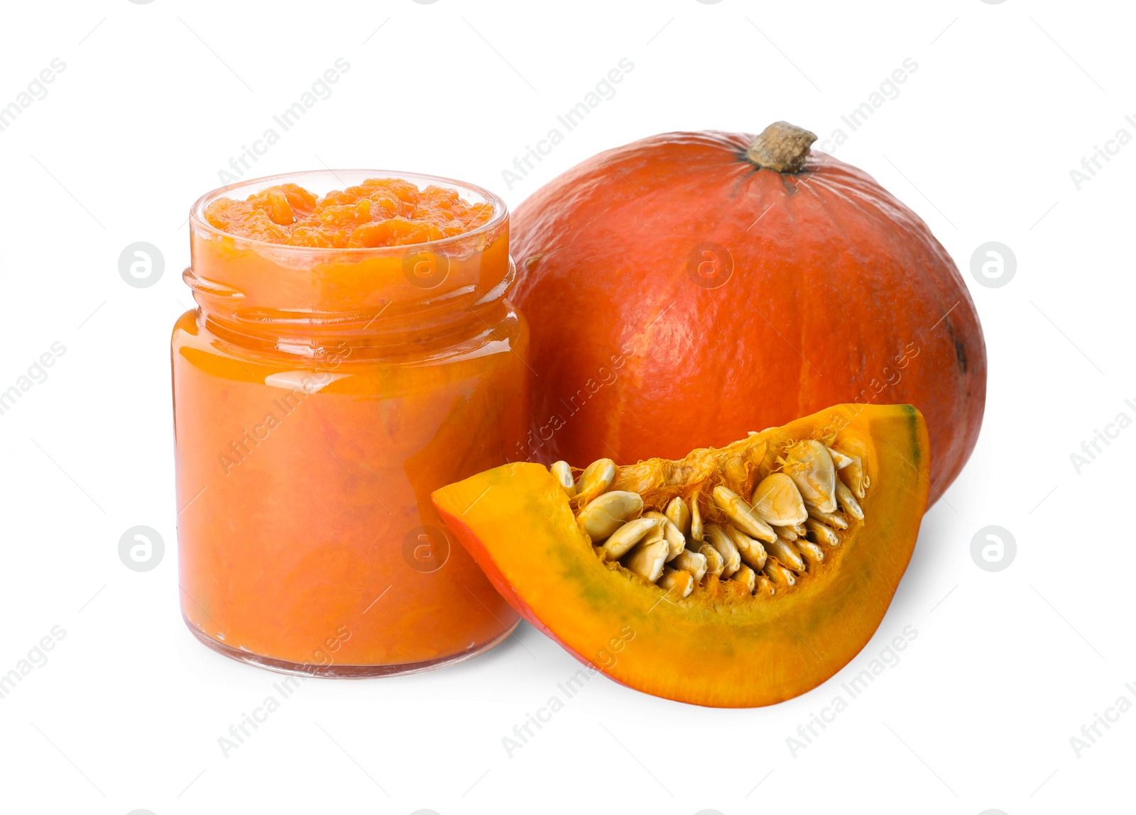 Photo of Jar of pumpkin jam and fresh pumpkins on white background