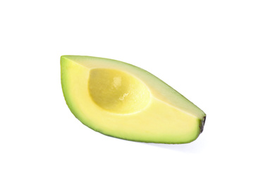 Photo of Slice of ripe avocado isolated on white