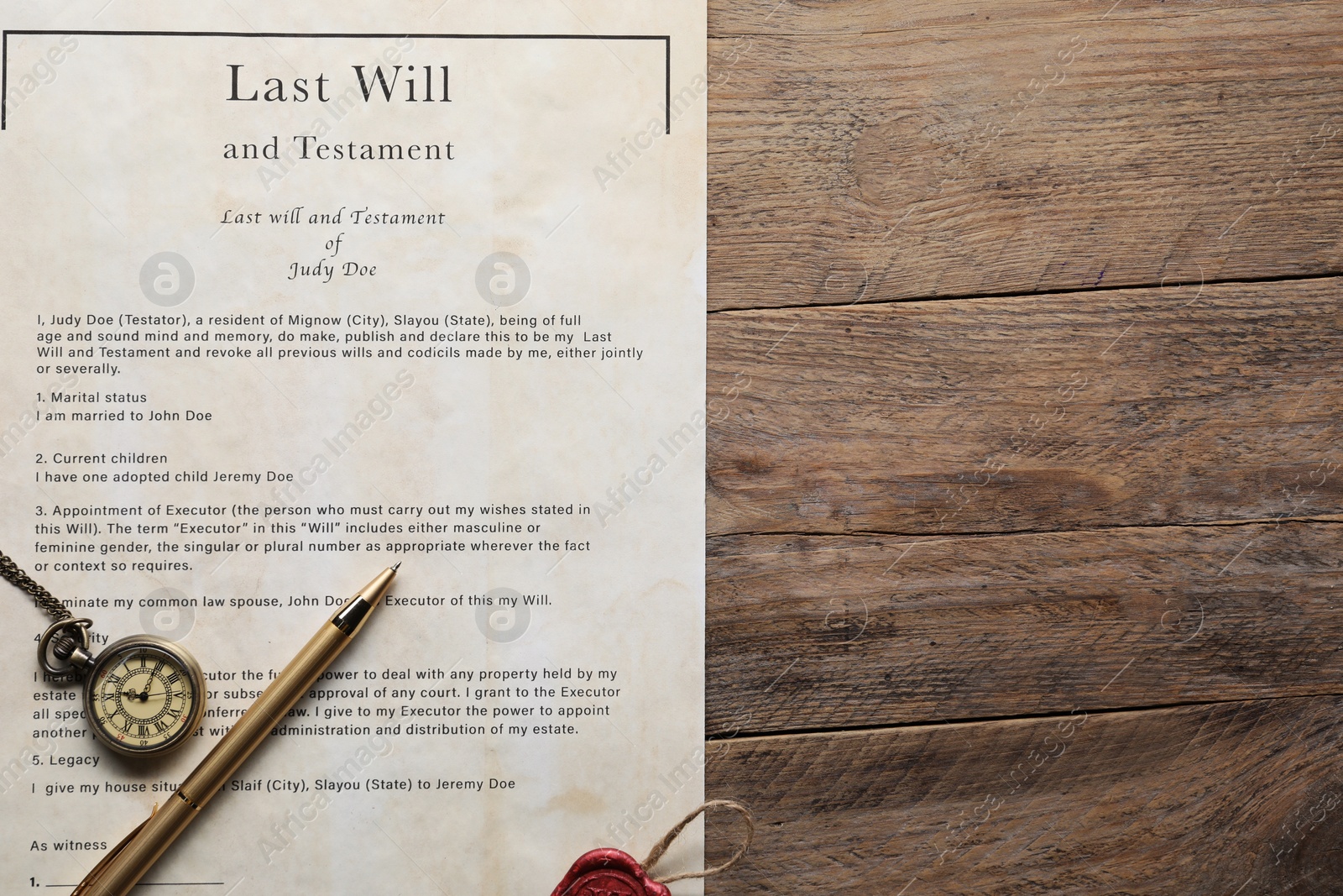 Photo of Last Will and Testament, pocket watch and pen on wooden table, top view. Space for text