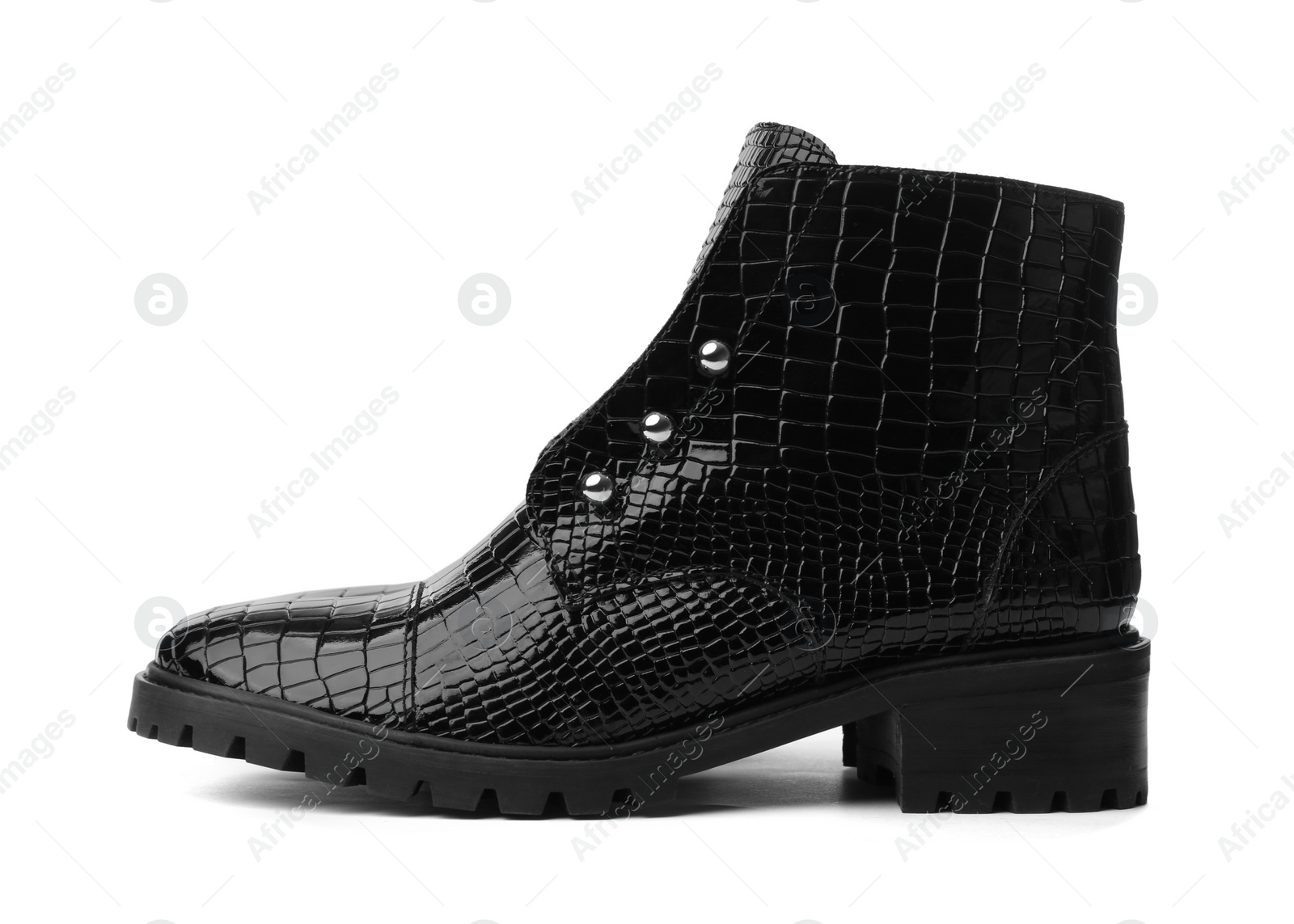 Photo of Stylish leather ankle boot isolated on white