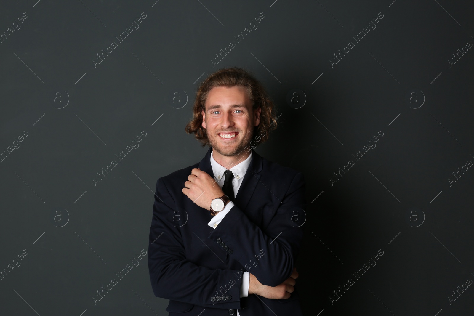 Photo of Portrait of handsome man on dark background