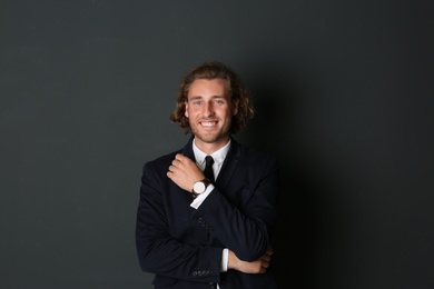 Portrait of handsome man on dark background