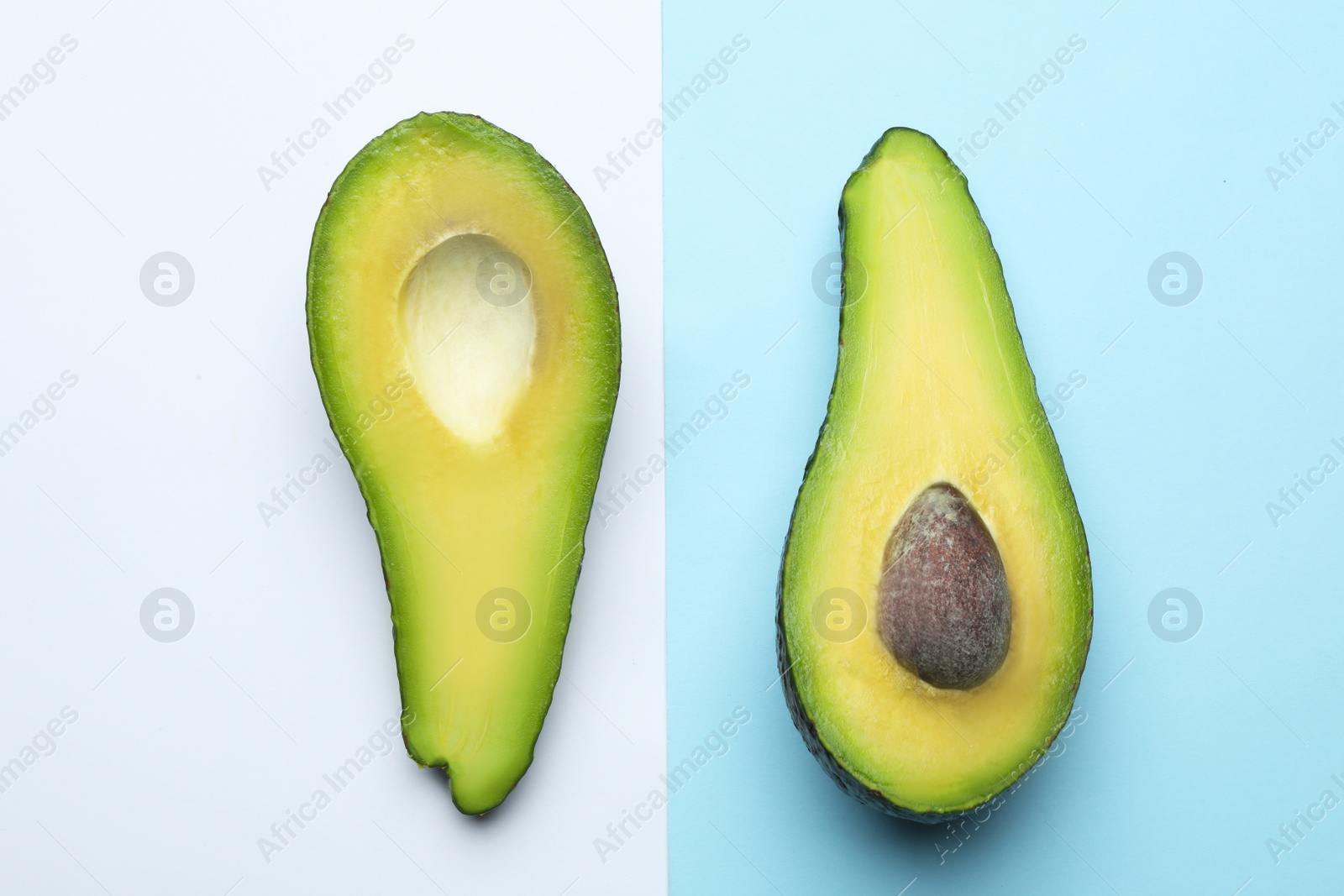 Photo of Flat lay composition with fresh ripe avocado on color background