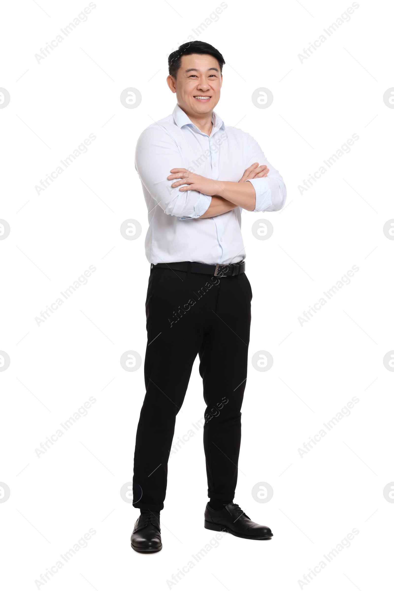 Photo of Businessman in formal clothes posing on white background