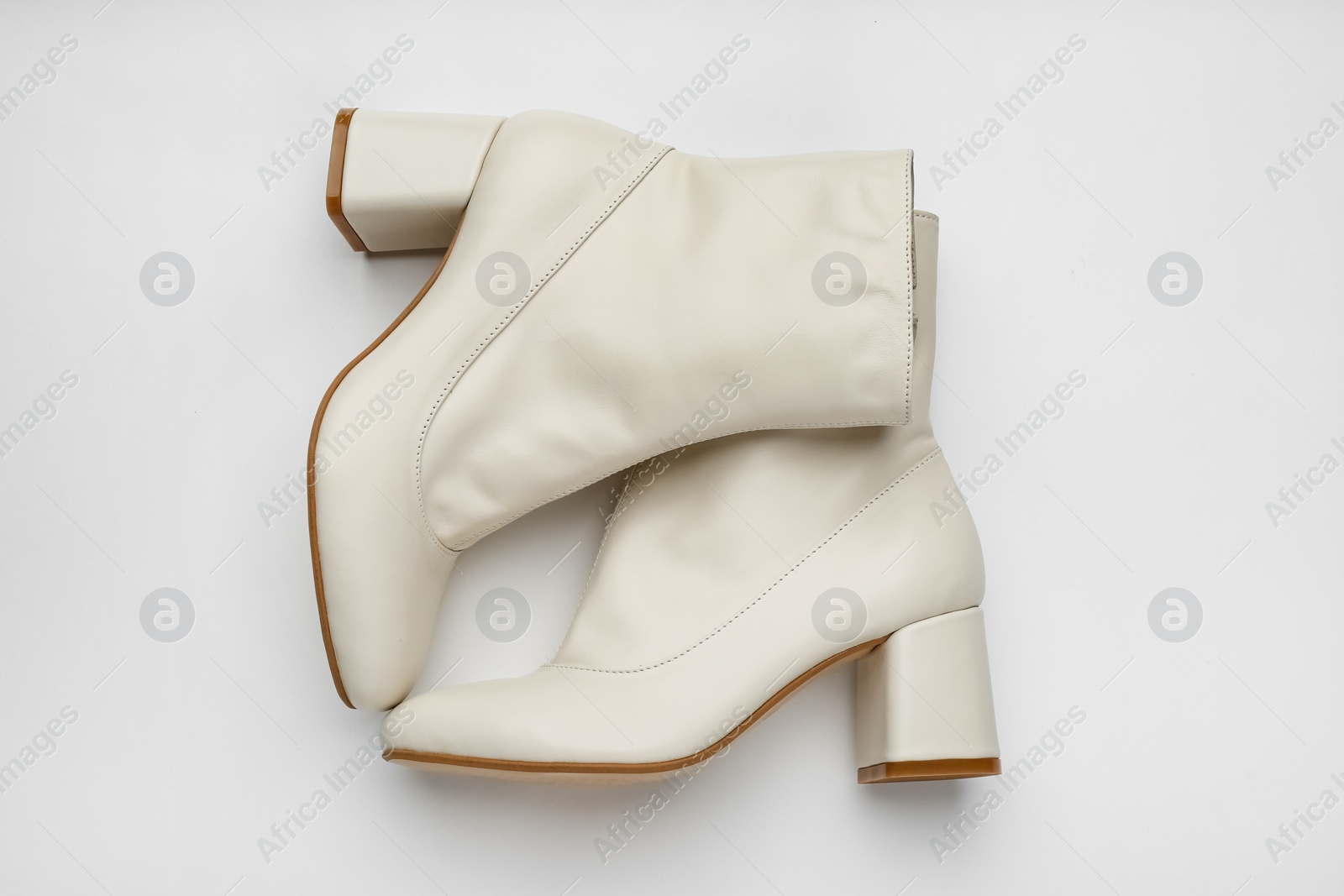 Photo of Pair of stylish leather shoes on white background, top view