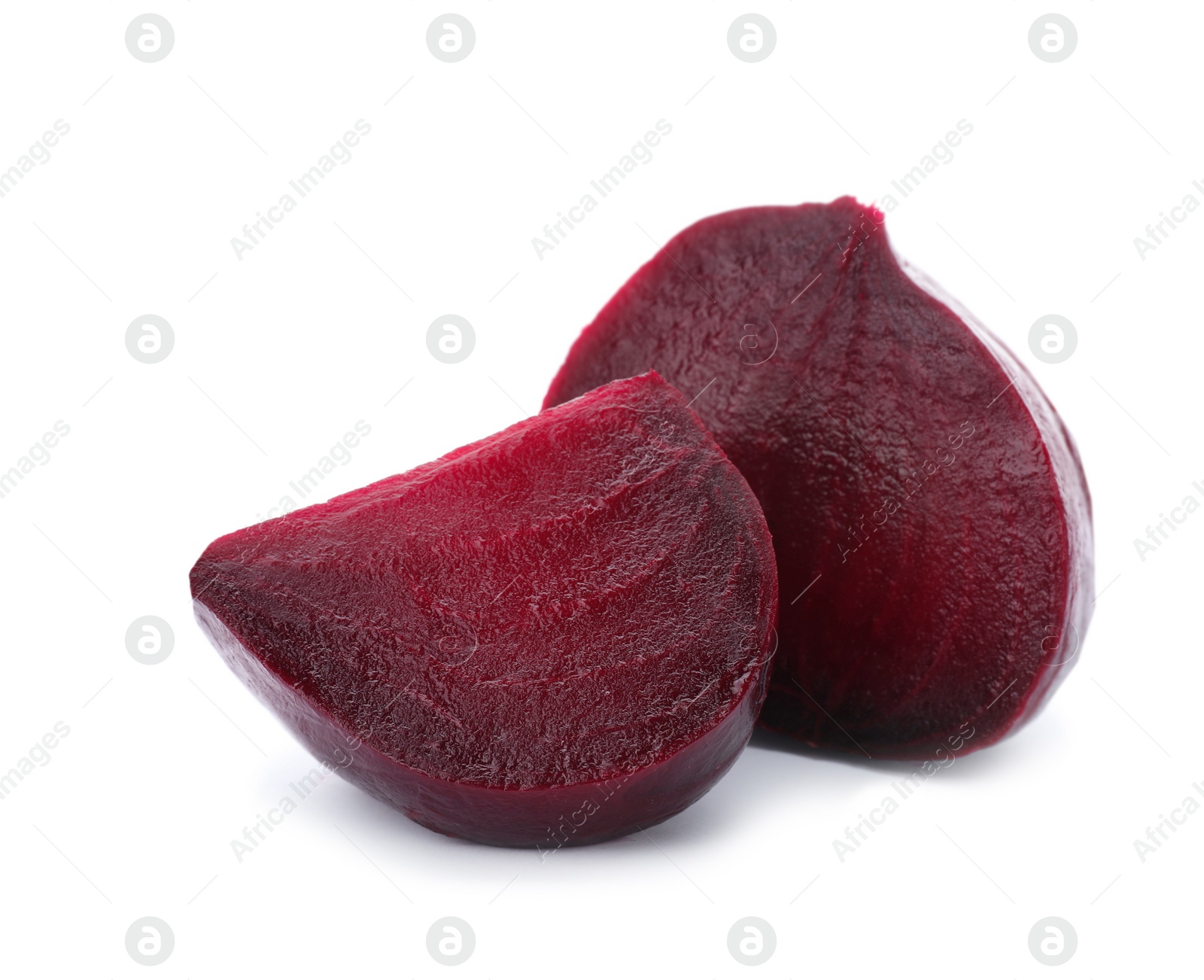 Photo of Cut boiled beet on white background. Taproot vegetable