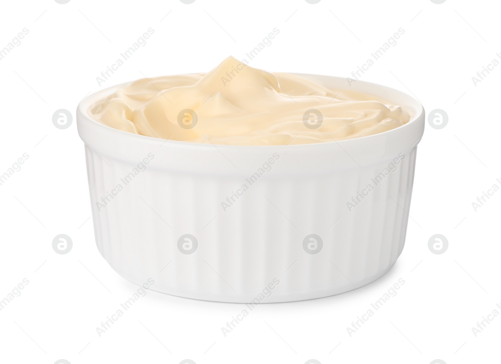 Photo of Tasty mayonnaise in bowl isolated on white