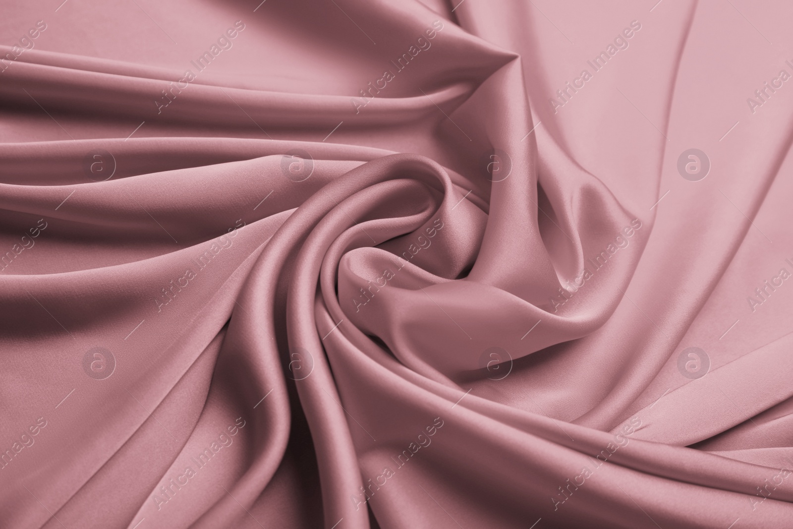 Image of Delicate pink silk fabric as background, closeup view