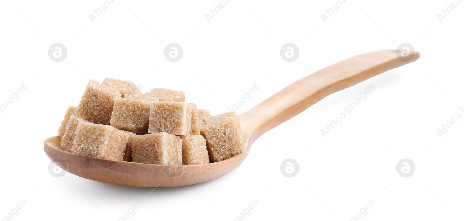 Photo of Brown sugar cubes in wooden spoon isolated on white