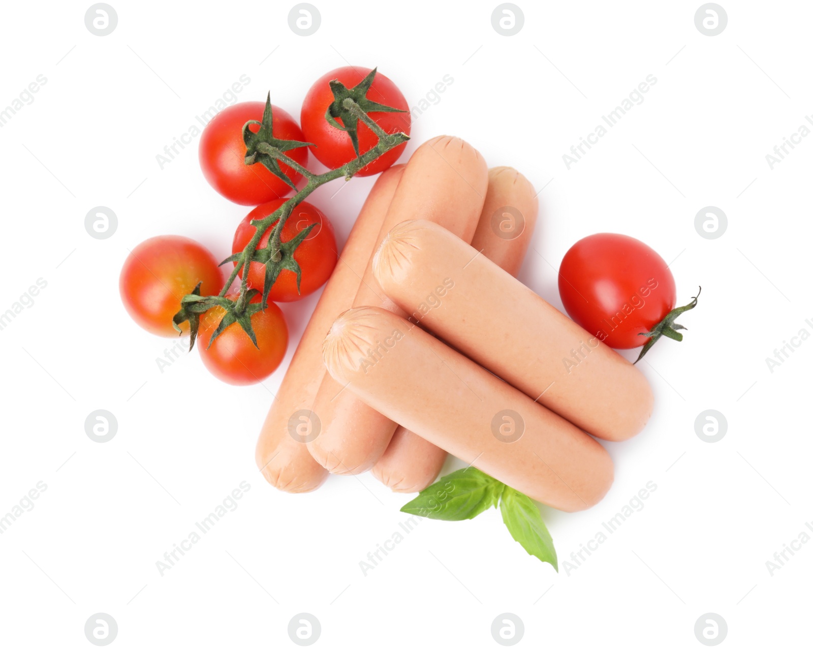 Photo of Delicious boiled sausages, tomatoes and basil on white background, top view