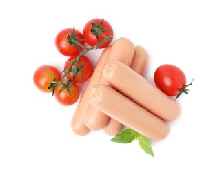 Photo of Delicious boiled sausages, tomatoes and basil on white background, top view