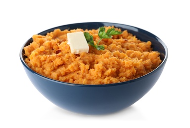 Photo of Bowl with mashed sweet potatoes on white background