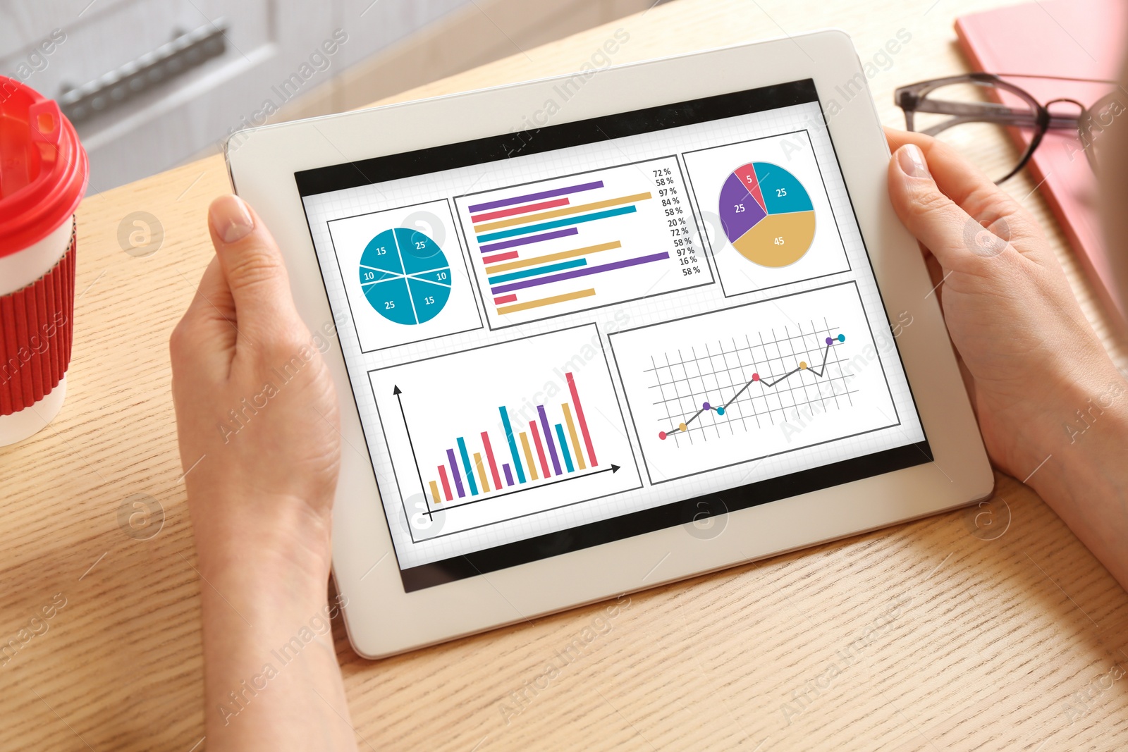 Image of Value concept. Woman working with tablet at table, closeup