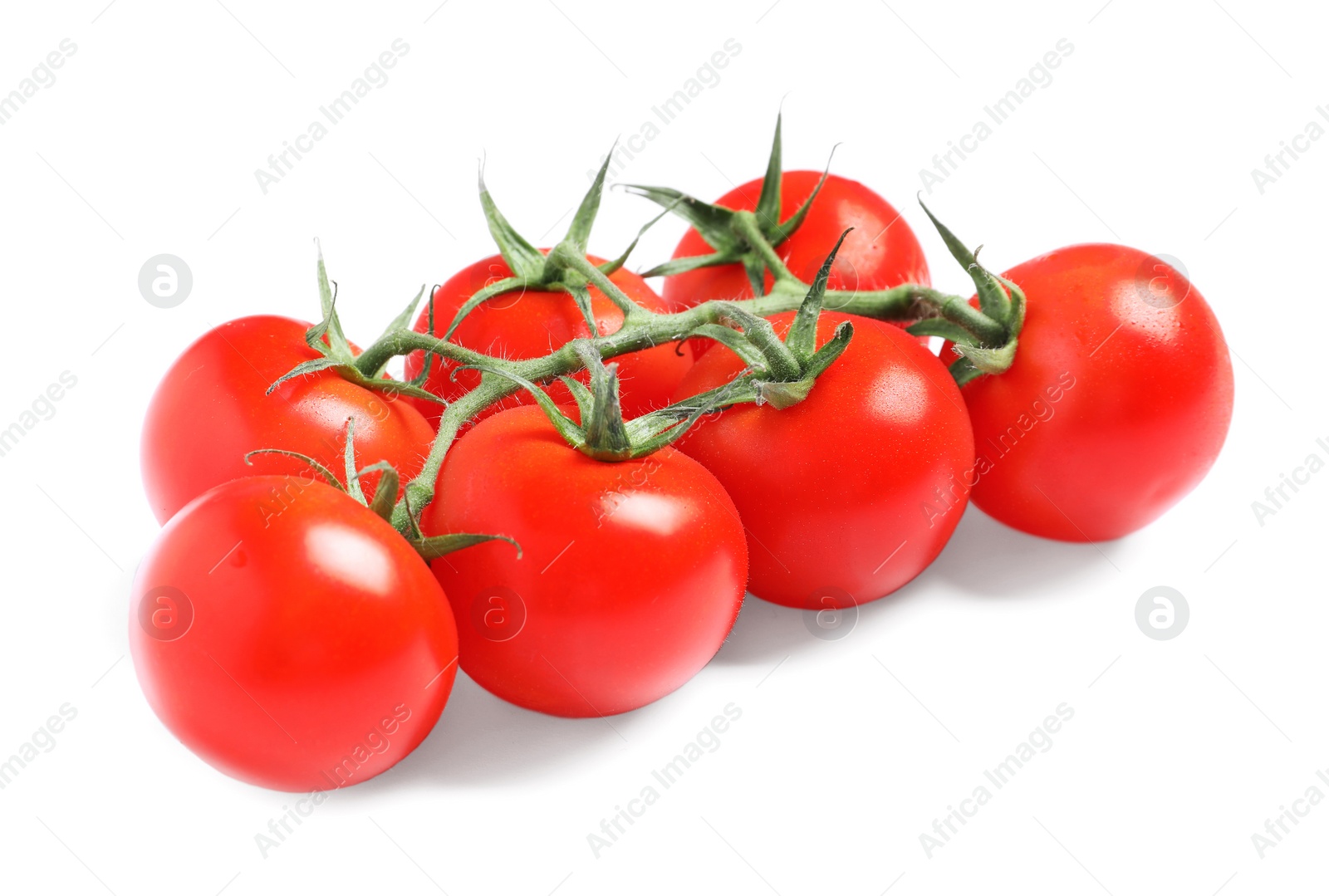 Photo of Branch of fresh cherry tomatoes isolated on white