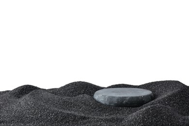 Photo of Presentation of product. Stone podium on black sand against white background