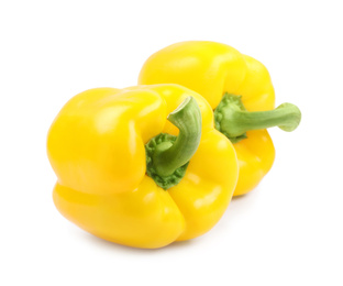 Photo of Ripe yellow bell peppers isolated on white