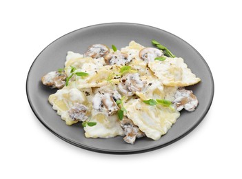 Delicious ravioli with tasty sauce and mushrooms isolated on white