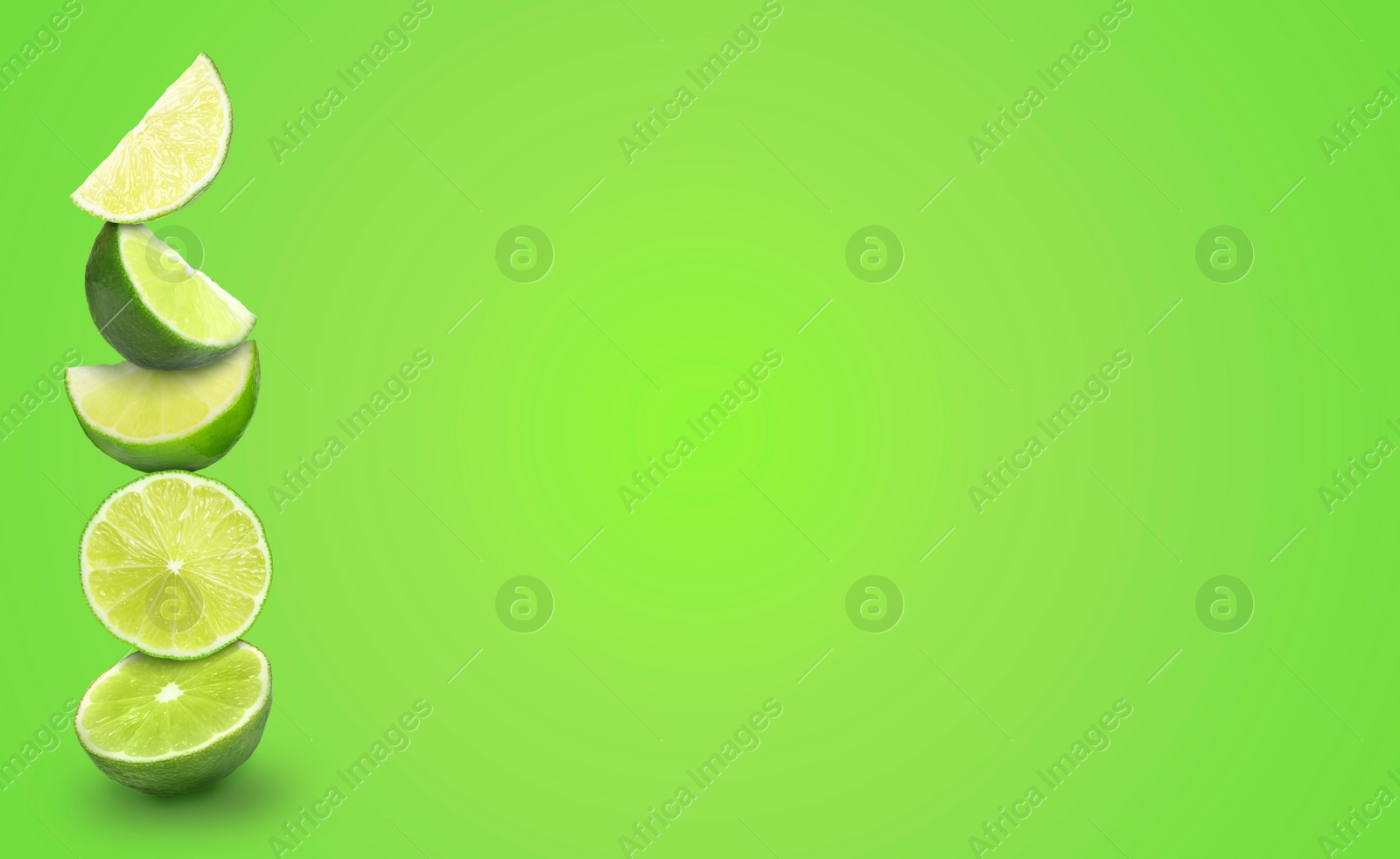 Image of Stacked cut limes on bright green background, space for text