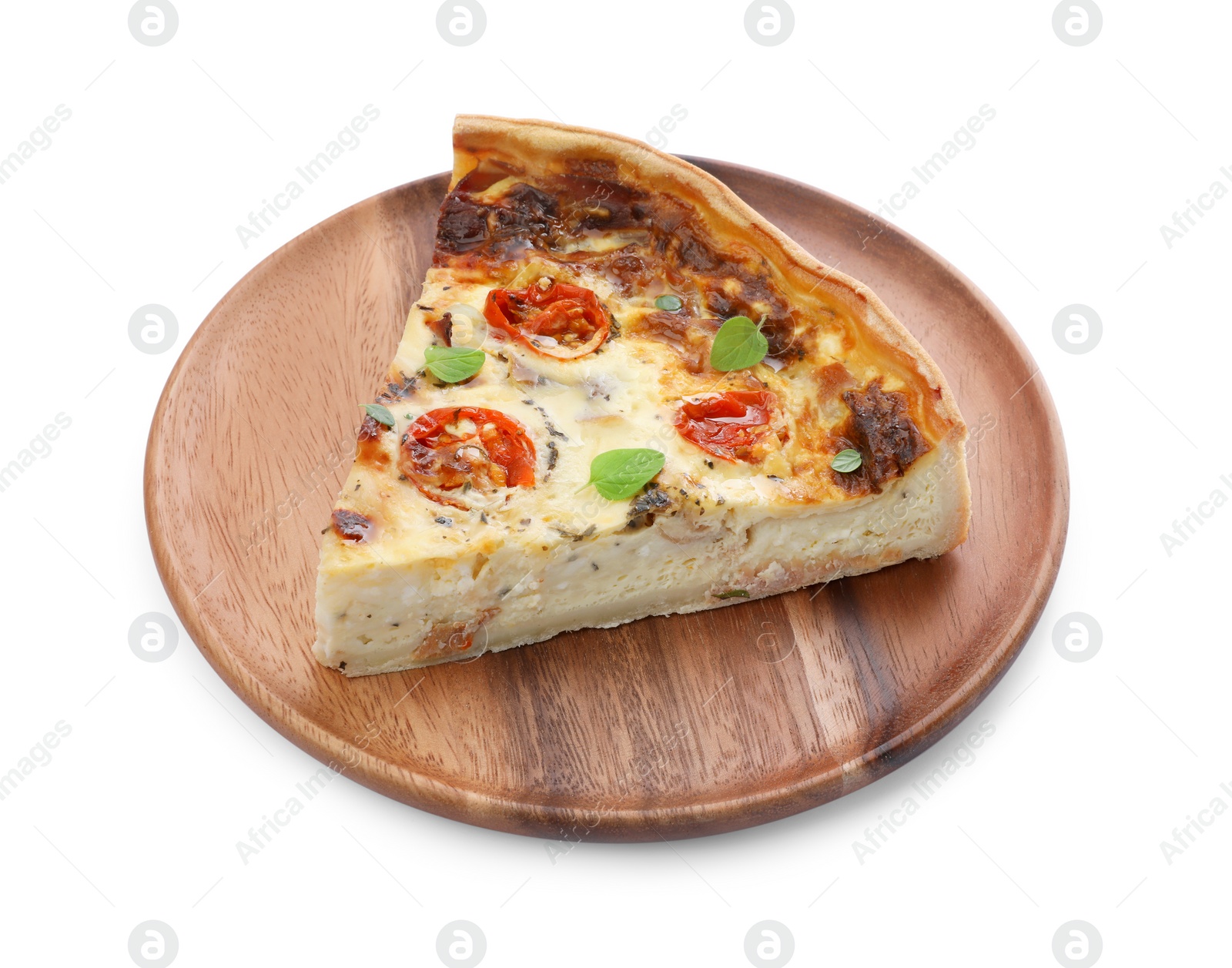 Photo of Piece of delicious homemade quiche with prosciutto, tomatoes and greens isolated on white