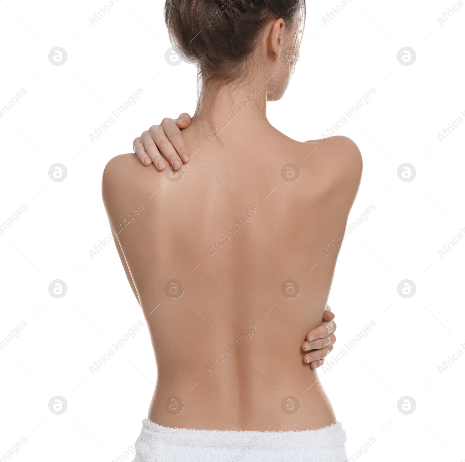 Photo of Back view of woman with perfect smooth skin on white background. Beauty and body care