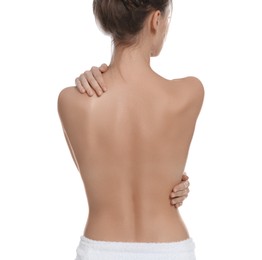 Back view of woman with perfect smooth skin on white background. Beauty and body care