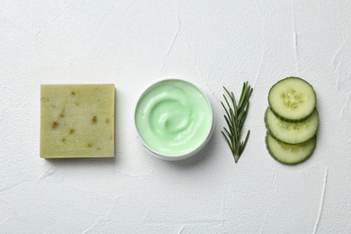 Photo of Flat lay composition with body care products and ingredients on white background