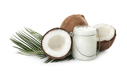 Photo of Composition with organic coconut oil on white background. Healthy cooking