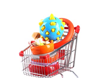 Different pet goods in shopping cart isolated on white. Shop items