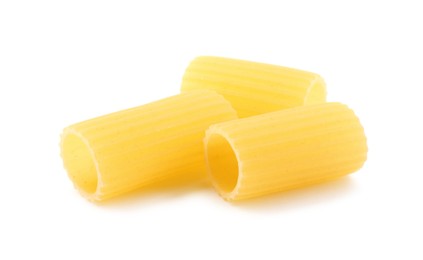 Photo of Raw rigatoni pasta isolated on white. Italian cuisine