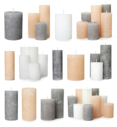 Image of Set of color wax candles on white background