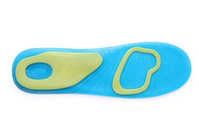 Photo of Light blue orthopedic insole isolated on white, top view